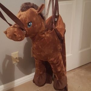 Horse costume with attached overalls.